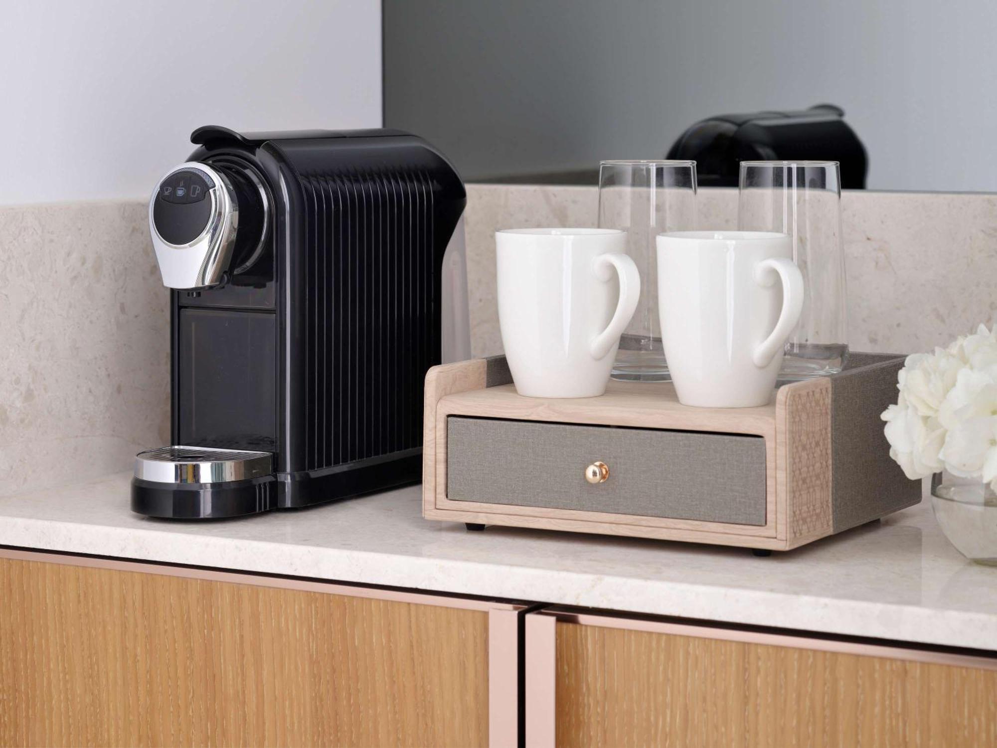 Moevenpick Hotel & Apartments Ghala Маскат Екстер'єр фото A Nespresso coffee machine