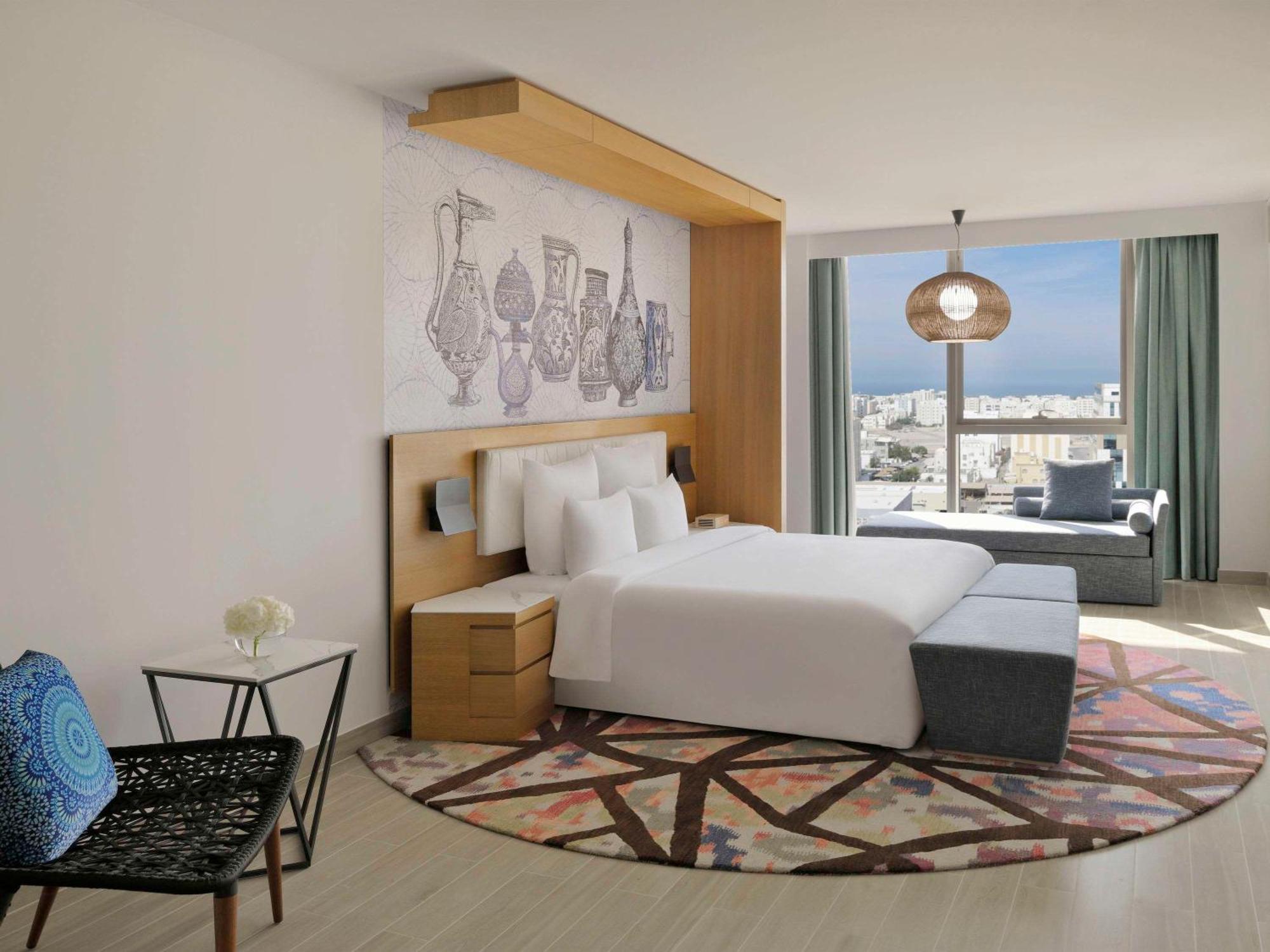 Moevenpick Hotel & Apartments Ghala Маскат Екстер'єр фото Deluxe room